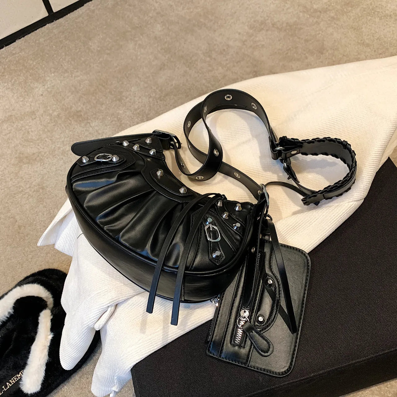 ZYB077 Edgy Elegance: Studded Half-Moon Bag